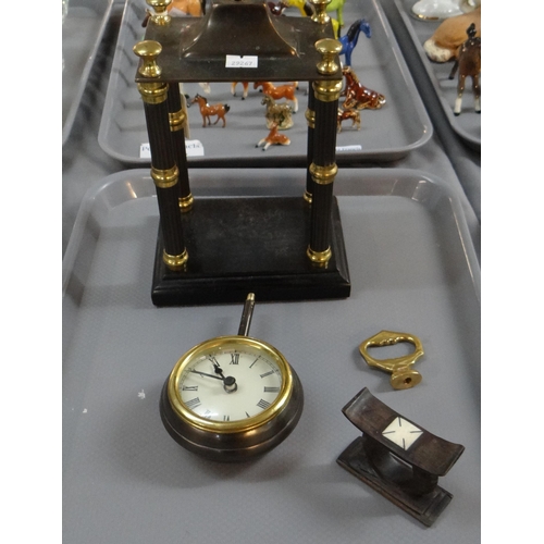 342 - Pedestal pendulum design clock with architectural pillars. Together with a carved wooden knife rest.... 