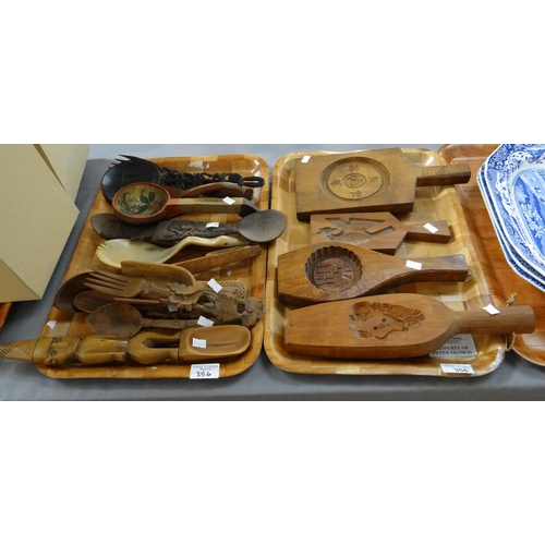 356 - Two trays of carved wooden items to include: oriental design butter pats, scoops and cutlery, salad ... 