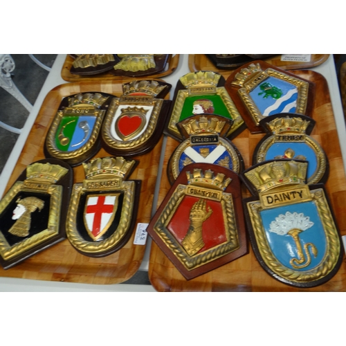 378 - Four trays of Royal Navy Ship's Crests to include: H.M.S Crusader, H.M.S Cleopatra, H.M.S Cordelia, ... 