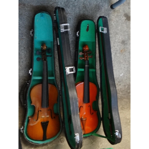 406 - Box containing three cased student violas and one student violin to include: two Stentor student vio... 