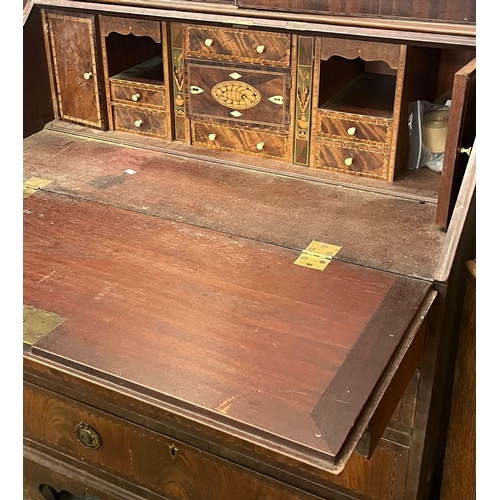 505 - 18th century mahogany bureau bookcase with beveled mirrored doors, the slope front revealing fitted ... 