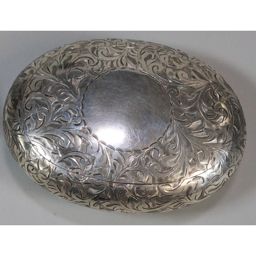 194 - George V silver snuff box with gilt interior, of engraved foliate pebble form. By Henry Williamson L... 