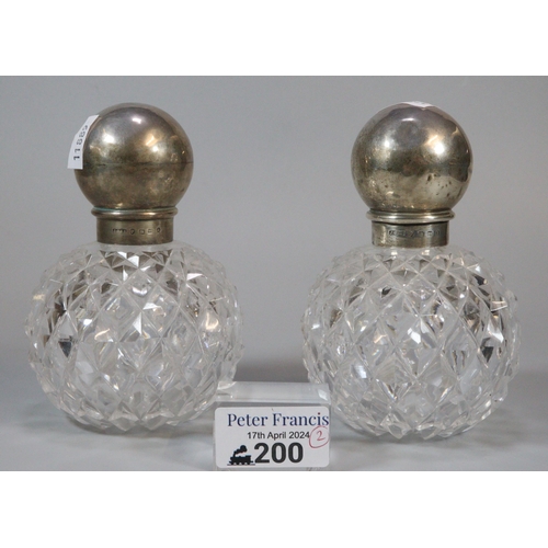 200 - Two silver topped and hobnail cut ladies scent bottles with star-cut bases (2) (B.P. 21% + VAT)