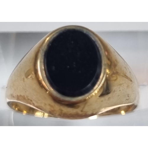 203 - 9ct gold and black hardstone signet ring.  3.2 g approx.  size L.  (B.P. 21% + VAT)