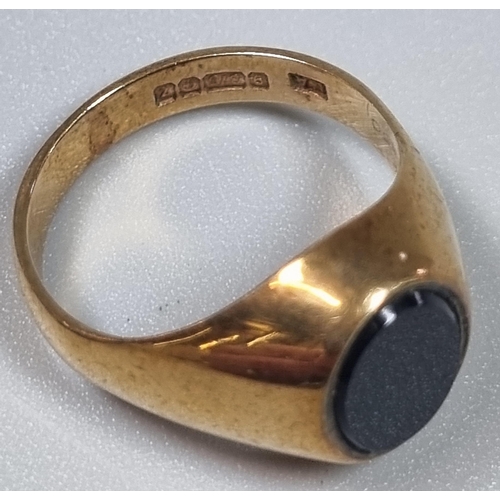 203 - 9ct gold and black hardstone signet ring.  3.2 g approx.  size L.  (B.P. 21% + VAT)