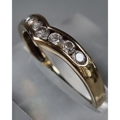 206 - 9ct gold and cubic zirconia wishbone ring.  1.4g approx.  Size L1/2.  (B.P. 21% + VAT)