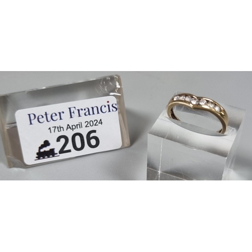 206 - 9ct gold and cubic zirconia wishbone ring.  1.4g approx.  Size L1/2.  (B.P. 21% + VAT)