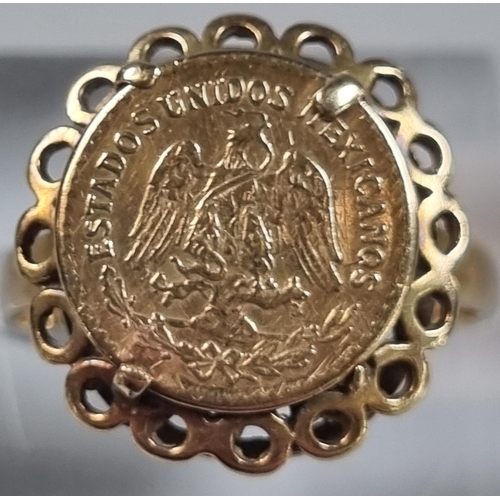 207 - 9ct gold ring inset with a small Mexican Pesos coin marked 'Estados Unidos Mexicanos'.  4g approx.  ... 