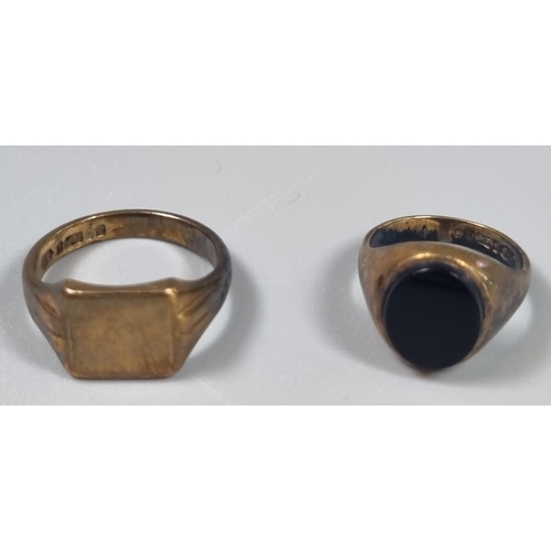 223 - 9ct gold signet ring.  6.6g approx.  Size R.  Together with a 9ct gold black hardstone signet ring. ... 