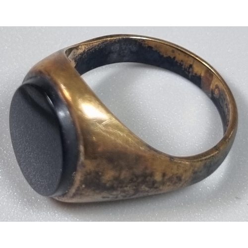 223 - 9ct gold signet ring.  6.6g approx.  Size R.  Together with a 9ct gold black hardstone signet ring. ... 