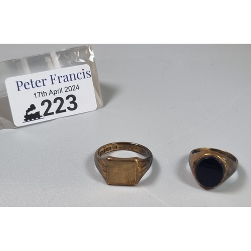 223 - 9ct gold signet ring.  6.6g approx.  Size R.  Together with a 9ct gold black hardstone signet ring. ... 