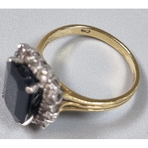 226 - 18ct gold diamond and black stone ring (possibly sapphire).  4.3g approx.  Size L1/2.  (B.P. 21% + V... 