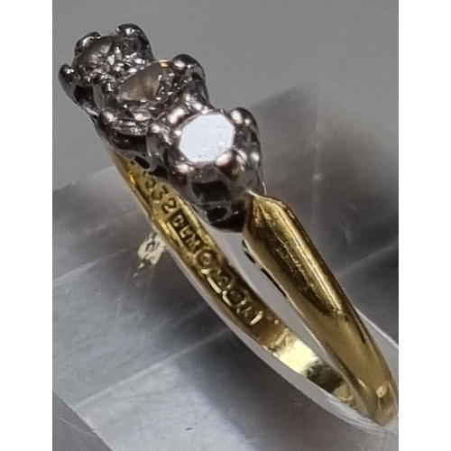 229 - 18ct gold three stone diamond ring.  3g approx.  Size M.  (B.P. 21% + VAT)