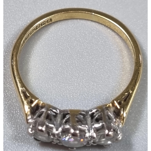 229 - 18ct gold three stone diamond ring.  3g approx.  Size M.  (B.P. 21% + VAT)