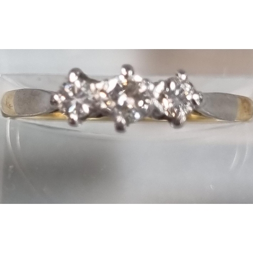 231 - 18ct gold diamond three stone ring.  1.7g approx.  Size N1/2.  (B.P. 21% + VAT)