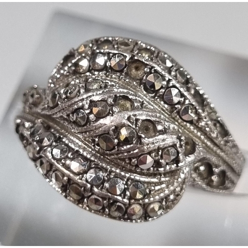 233 - 9ct gold eternity style ring.  1.7g approx. together with another eternity style ring and a marcasit... 