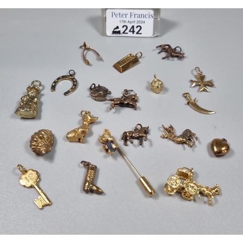 242 - Collection of 9ct gold and other charms to include: horse shoe, race horses, wishbone, dogs, gold in... 