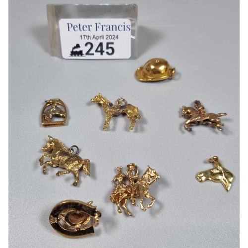 245 - Collection of equestrian and horse racing 9ct gold and other charms.  The gold 12.6g approx.  Total ... 