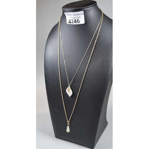 246 - Two 9ct gold fine link chains with mother of pearl leaf design pendant and another glass pendant.  4... 