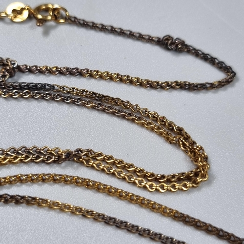 248 - 9ct gold chain with tiger's eye claw design pendant.  6g approx.  (B.P. 21% + VAT)