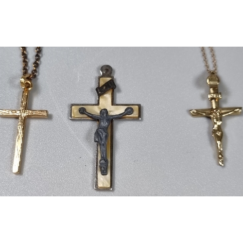 252 - Two 9ct gold chains with crucifix pendants together with another crucifix pendant.  6.4g approx.  (B... 