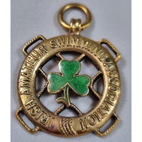 255 - 9ct gold and enamel cased pendant/fob marked 'Irish Amateur Swimming Association'.  8.6g approx.  (B... 