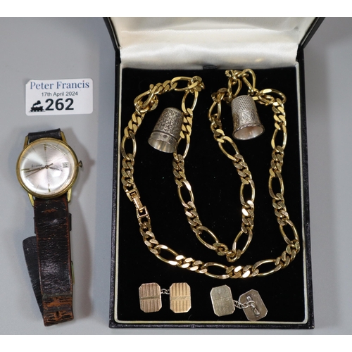 262 - Accurist gentleman's gold plated wristwatch on leather strap, two silver thimbles, two gold plated o... 