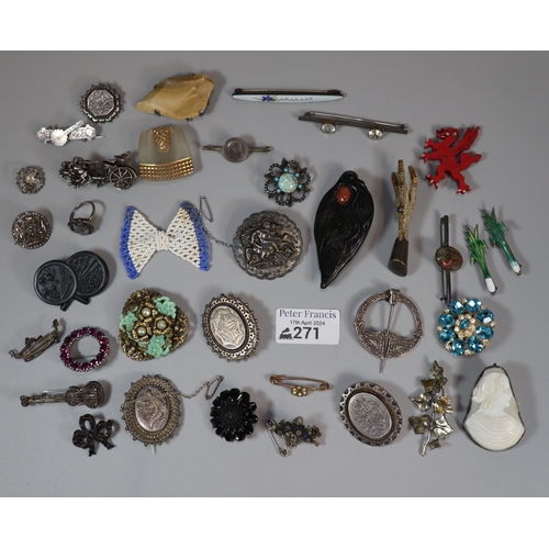 271 - Plastic tub of assorted Victorian costume and other broches, some silver: floral designs, novelty br... 