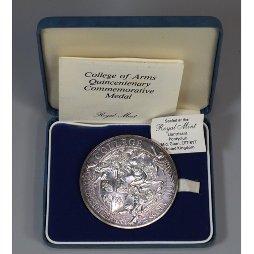 282 - The Royal Mint College of Arms Quincentenary Commemorative silver medallion in original fitted case.... 