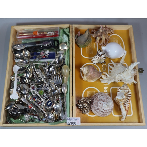 300 - Wooden box comprising assorted souvenir spoons together with a box of marine shells.  (B.P. 21% + VA... 