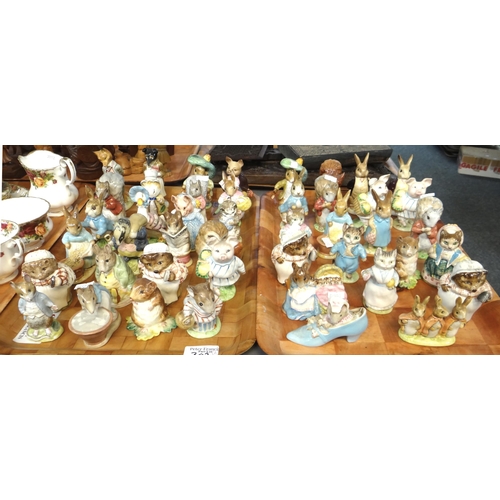 302 - Two trays comprising forty five Beswick Beatrix Potter figures with printed gold marks to bases to i...