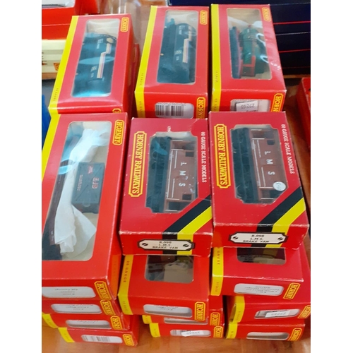 316 - Two trays with a collection of boxed Hornby OO gauge rolling stock to include: tenders, tankers, whe... 