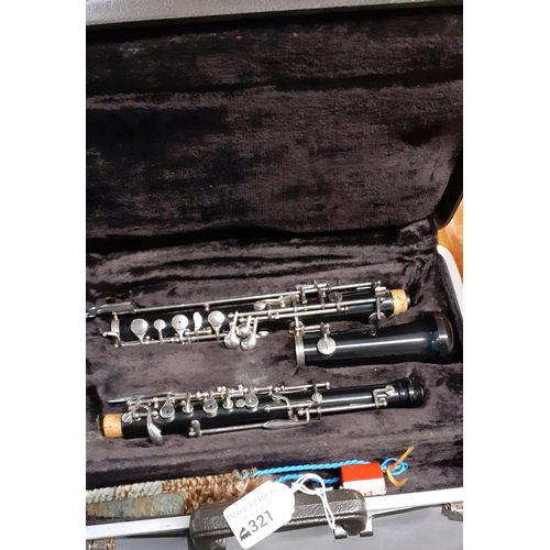 321 - Buescher Oboe in original fitted case.  (B.P. 21% + VAT)