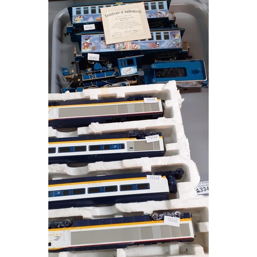 334 - Joeuf OO gauge Eurostar Locomotive and carriages in part box together with Thomas Kinkade's Christma... 