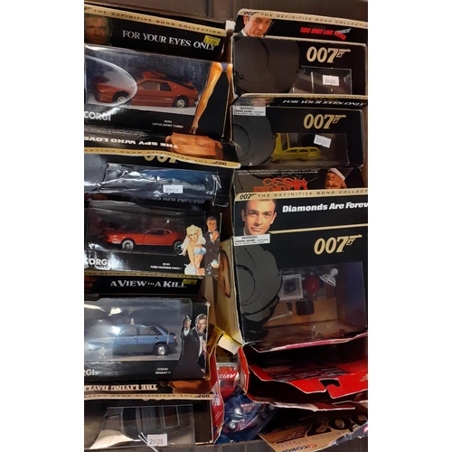 369 - Two trays comprising various Corgi James Bond diecast model vehicles, all appearing in original boxe... 