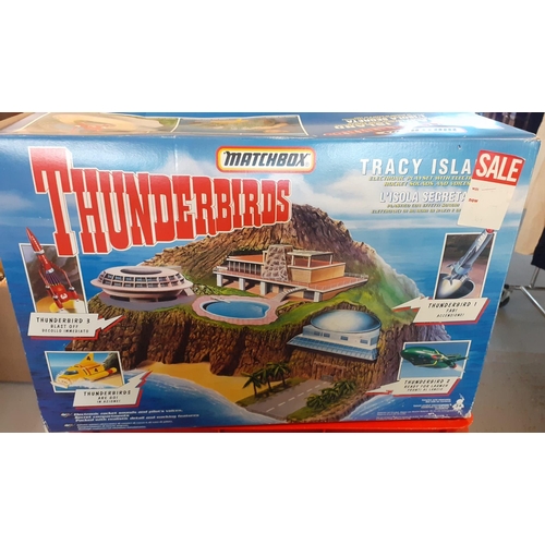 374 - Collection of Matchbox and other Thunderbirds items to include: Tracey Island, various figurines in ... 