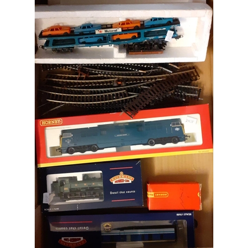 391 - Two trays of trains and rolling stock, some in original boxes to include: Bachmann Branch-Line, Horn... 