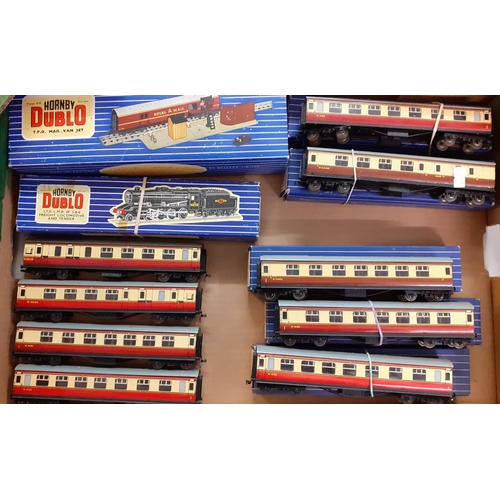 393 - Large collection in four boxes of OO gauge trains and rolling stock to include: Hornby Dublo mail va... 