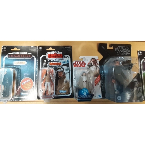 399 - Collection of Star Wars figures, all in original packaging to include: Princess Leia Organa, Hans So... 