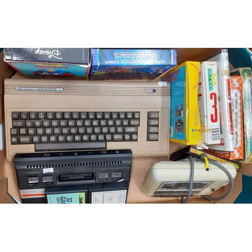 401 - Commodore 64 with  datassette, Atari 2600 console and various games including: The Hobbit (no case),... 