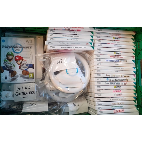 418 - Collection of gaming consoles to include: Nintendo Wii Fit in original box with Wii Fit Pad together... 