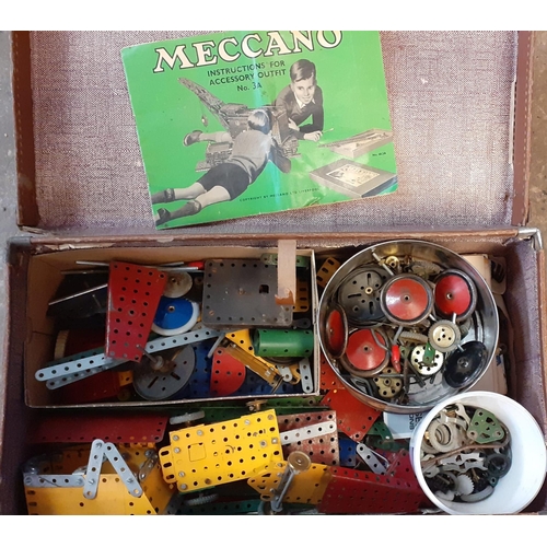 421 - Vintage suitcase comprising vintage Meccano, instructions, motors, wheels, tools etc. together with ... 