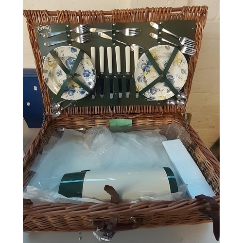 442 - Wicker picnic hamper with accessories together with a modern folding and travelling picnic table.   ... 