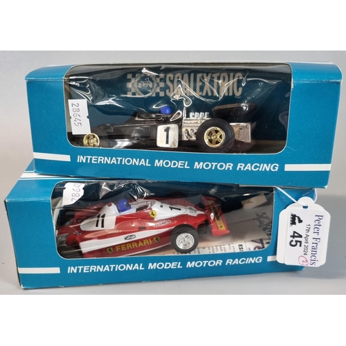 45 - Two Scalextric Formula 1 racing cars to include: John Player Special and Ferrari 312 in associate Sc... 
