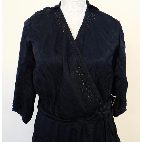 458 - Vintage 1930's hand made navy silk drop waist dress with beaded detail. 
(B.P. 21% + VAT)