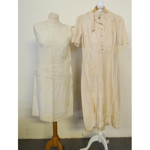 459 - Two vintage dresses; one Austrian silk (probably 1940's) with pleated skirt by Wien and a cream crep... 