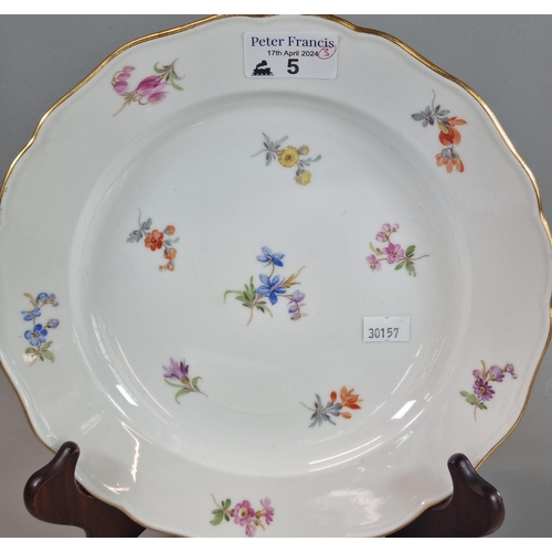 5 - Pair of Meissen porcelain plates, with gilt rims and floral sprays together with a similar smaller p... 