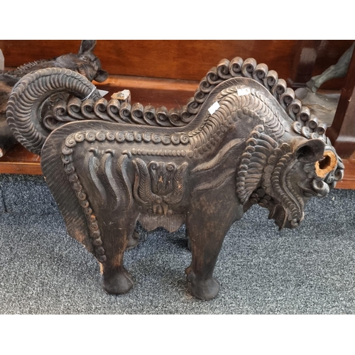 72 - Two unusual Indo Persian design terracotta studies of standing mythical horses.  57cm long approx.  ... 