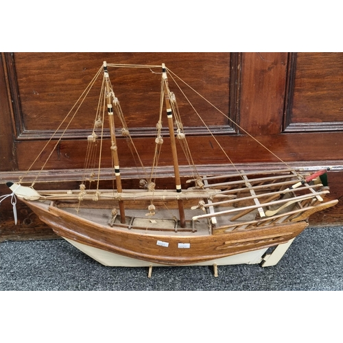 74 - Wooden scale model of an Arab Dhow sailing vessel.  64cm long approx.   (B.P. 21% + VAT)