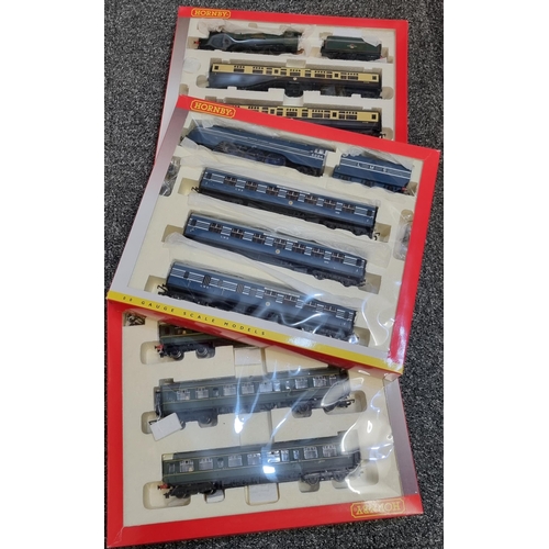 80 - Modern Hornby OO gauge scale model train packs, to include: the Cathedrals Express, Coronation Scot,... 